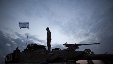 israeli-soldier-on-tank-with-flag