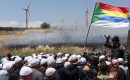 Israeli security forces deploy to disperse a protest by members of the local community near the Druze village of Majdal Shams in the Israel-annexed Golan Heights, on June 20, 2023, against an Israeli wind turbine project reportedly planned in agricultural lands of the village. (Photo by JALAA MAREY/AFP via Getty Images)